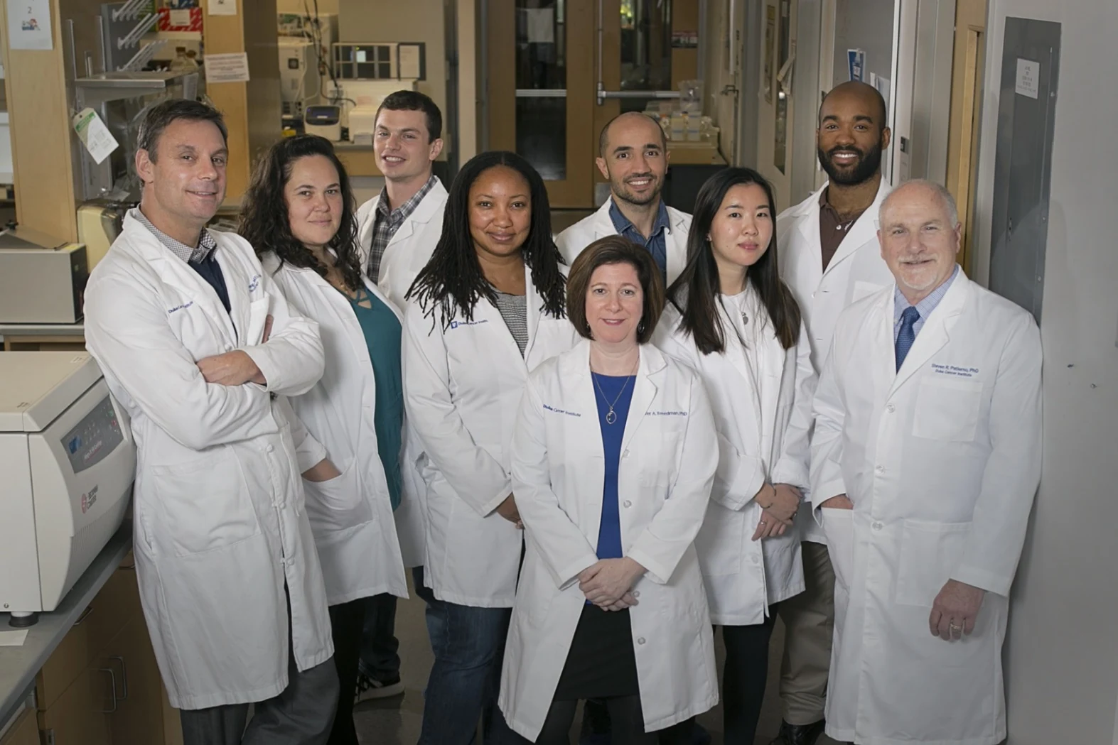 Members of the Duke research team pictured in Tyler Allen’s AACR presentation.