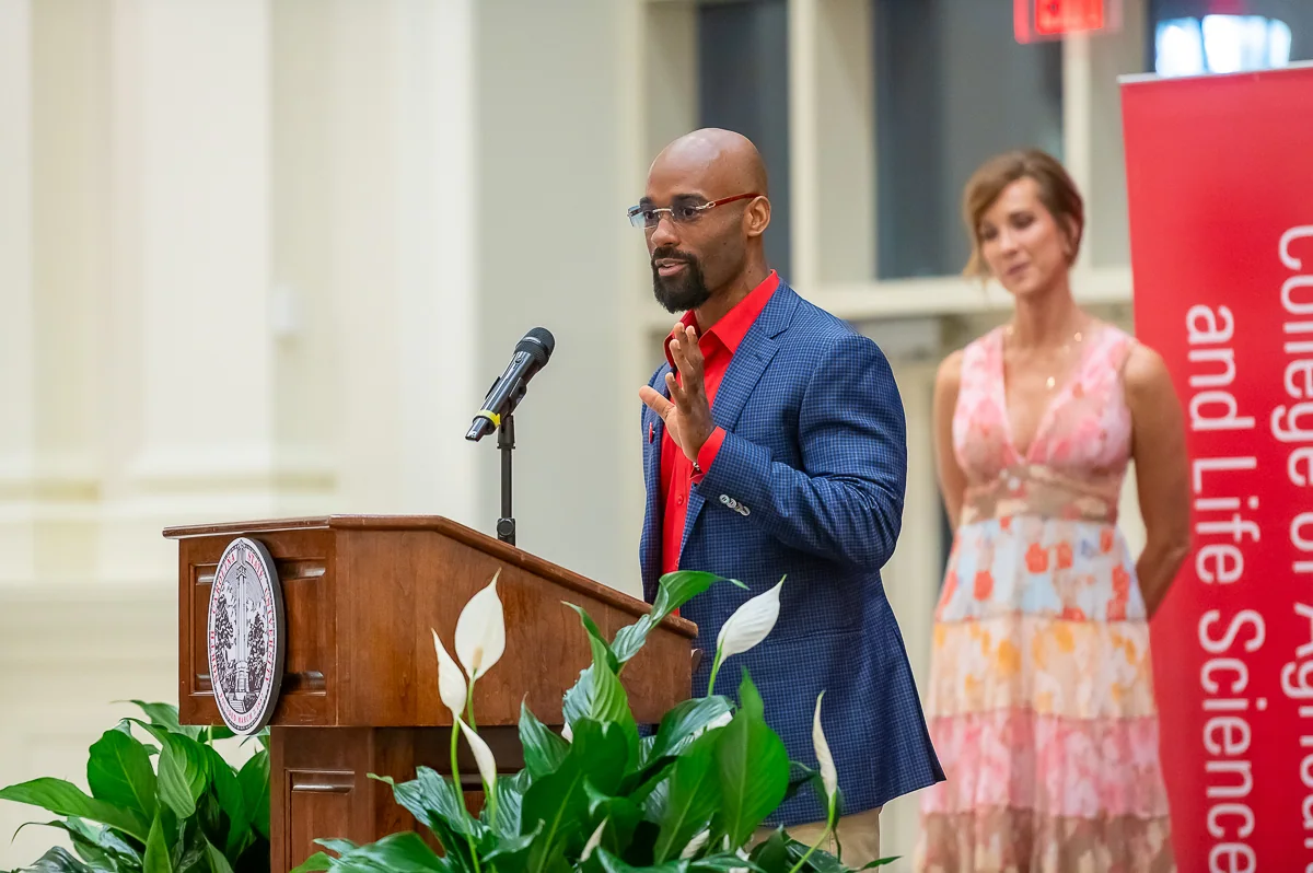 Tyler Allen speaking at the 2026 NC State CALS alumni event.