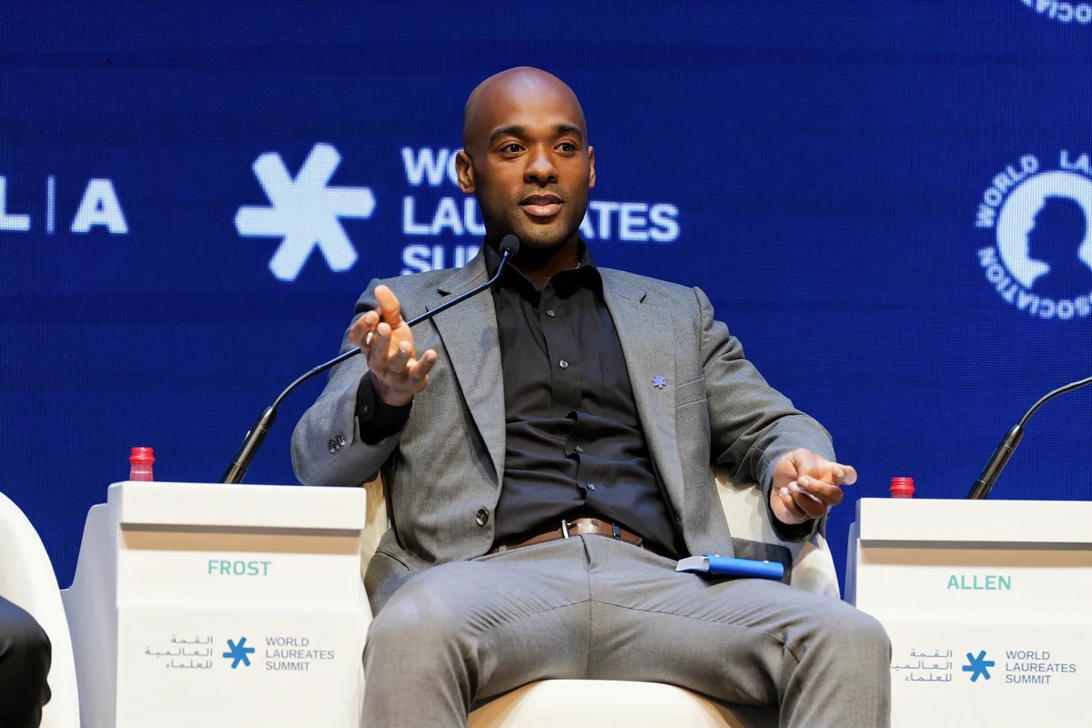Tyler Allen contributing to a panel at the World Laureates Summit.